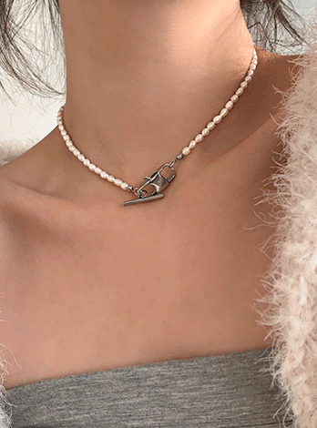 Surgical pearl buckle necklace